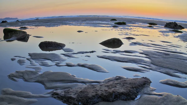 Puesta de sol en la costa atlántica — Foto de Stock