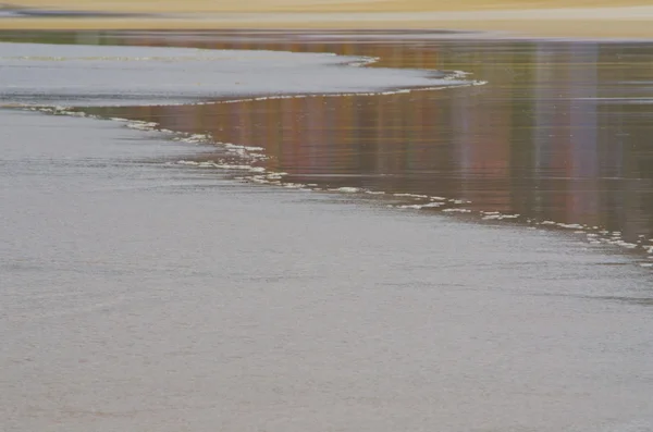 Op het strand — Stockfoto