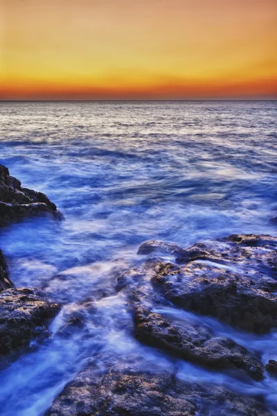 Západ slunce na pobřeží Atlantského oceánu. — Stock fotografie