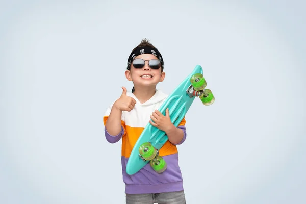 Little Cool Skater Boy Wearing Stylish Clothes Sunglasses Holds Turquoise — Stock Photo, Image