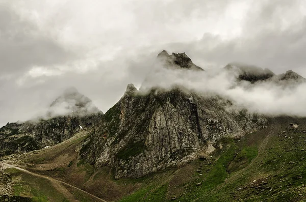 Cloudy hill — Stock Photo, Image