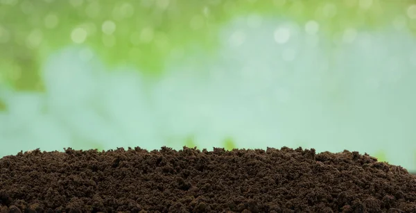 Bruin Bodemoppervlak Met Groene Achtergrond Stockfoto