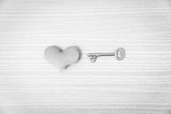 Red heart with key black and white color — Stock Photo, Image