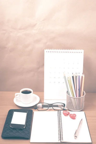Office desk : coffee with phone,wallet,calendar,color pencil box — Stock Photo, Image