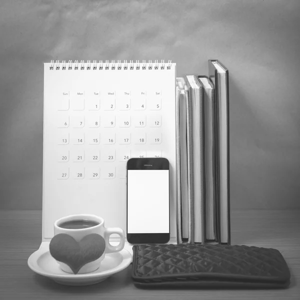 Office desk : coffee with phone,wallet,calendar,heart,stack of b — Stock Photo, Image