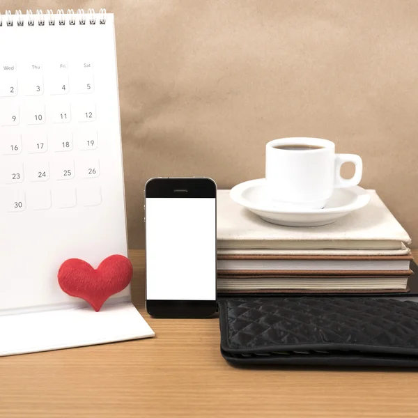 office desk : coffee with phone,wallet,calendar,heart,stack of b