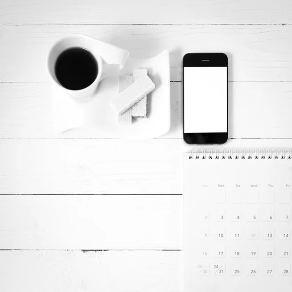 Coffee cup with wafer,phone,calendar black and white color — Stock Photo, Image