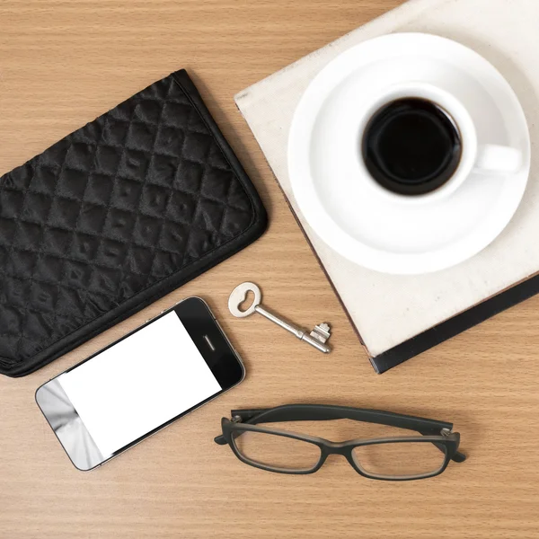 Coffee and phone with stack of book,key,eyeglasses and wallet — Stock Photo, Image