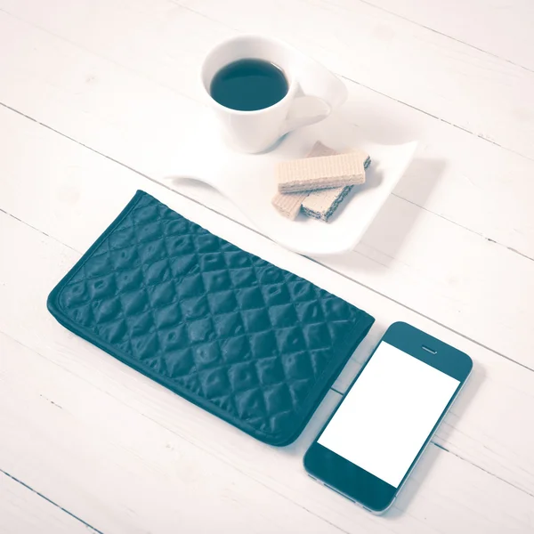 Coffee cup with wafer,phone,wallet vintage style — Stock Photo, Image