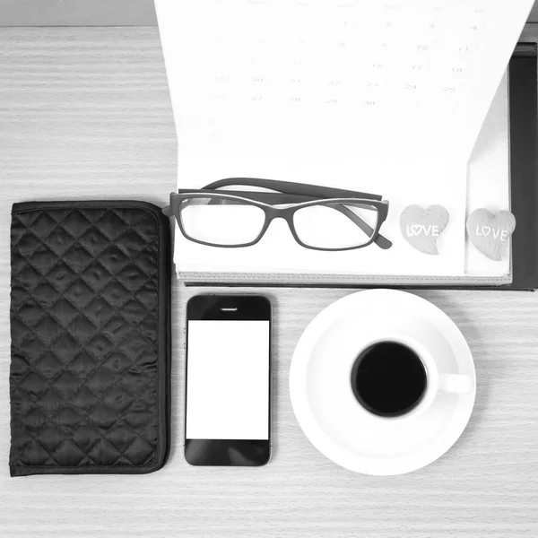 Office desk : coffee with phone,wallet,calendar,heart,stack of b — Stock Photo, Image