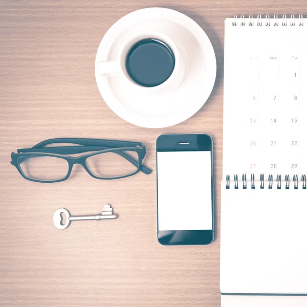 Coffee and phone with key,eyeglasses,notepad,calendar vintage st — Stock Photo, Image