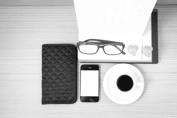 Office desk : coffee with phone,wallet,calendar,heart,stack of b — Stock Photo, Image