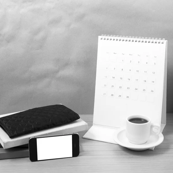 Working table : coffee with phone,stack of book and wallet black — Stock Photo, Image