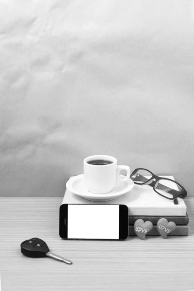 Office desk : coffee and phone with car key,eyeglasses,stack of — Stock Photo, Image