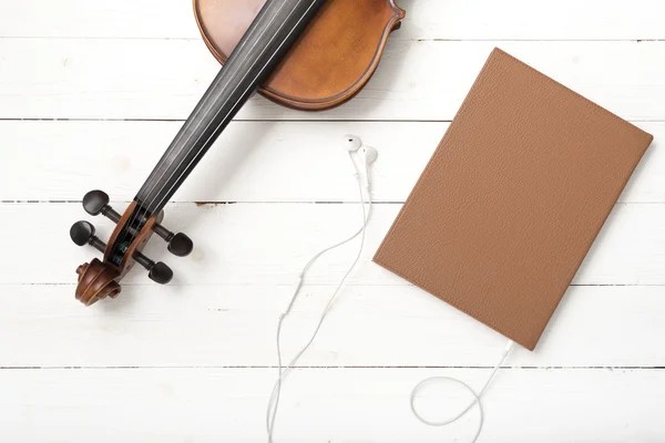 Vista dall'alto del notebook e dell'auricolare per violino — Foto Stock