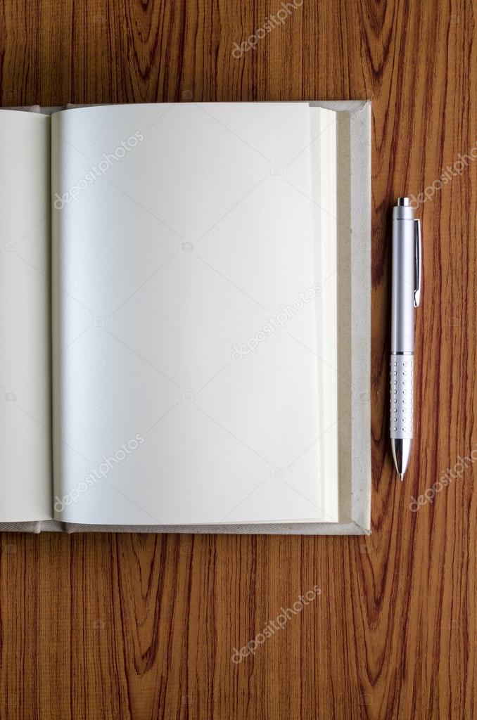 Notebook on table Stock Photo by ©ammza12 54881693