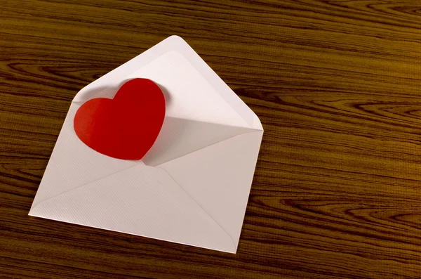 Red heart with pink envelope — Stock Photo, Image