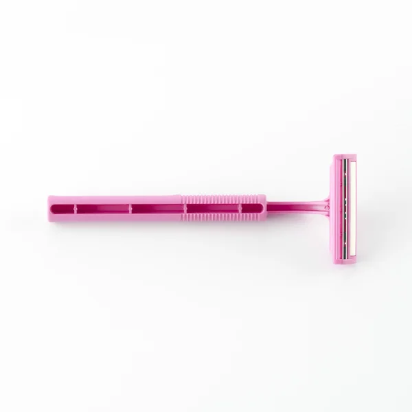 Розовый одноразовый бритье — стоковое фото