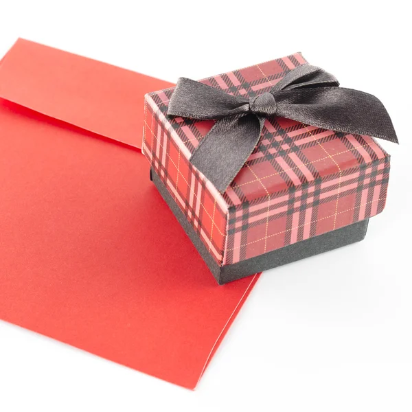 Red envoloper and scotch gift box isolated on white — Stock Photo, Image