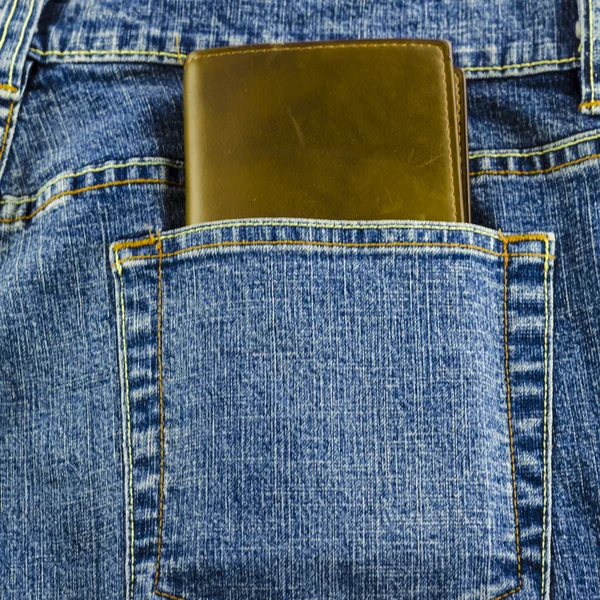 Blue jeans pocket with wallet — Stock Photo, Image