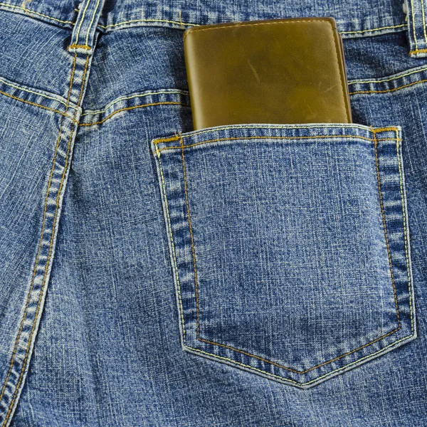 Blue jeans pocket with wallet — Stock Photo, Image