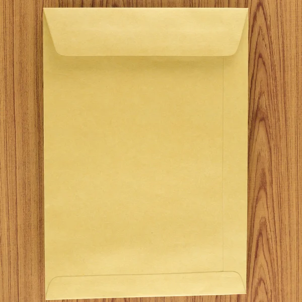 Brown envelope on  table — Stock Photo, Image