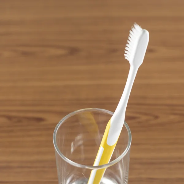 Toothbrush in glass — Stock Photo, Image