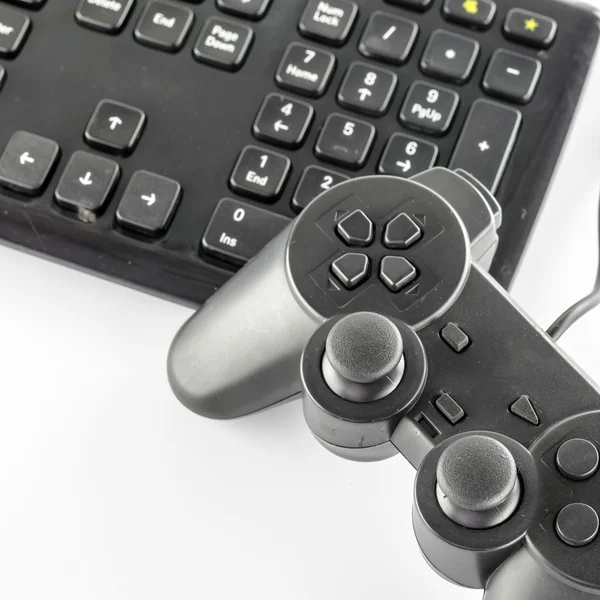 Клавіатурний комп'ютер та ігровий контролер — стокове фото