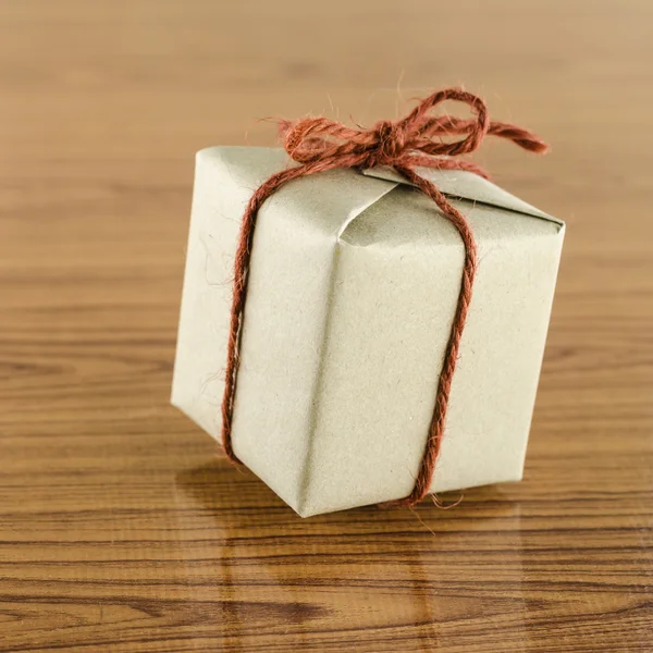 Brown gift box with heart tag card Stock Photo by ©ammza12 54933763