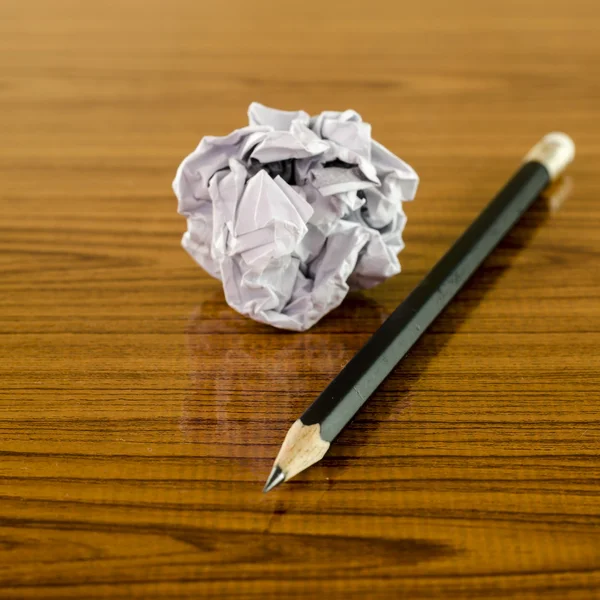 Crumpled paper and pencil — Stock Photo, Image