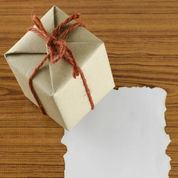 Gift box with paper — Stock Photo, Image