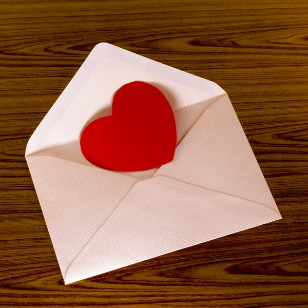 Red heart with pink envelope — Stock Photo, Image