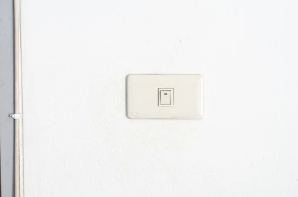 Białe przełącznik na ścianie — Zdjęcie stockowe