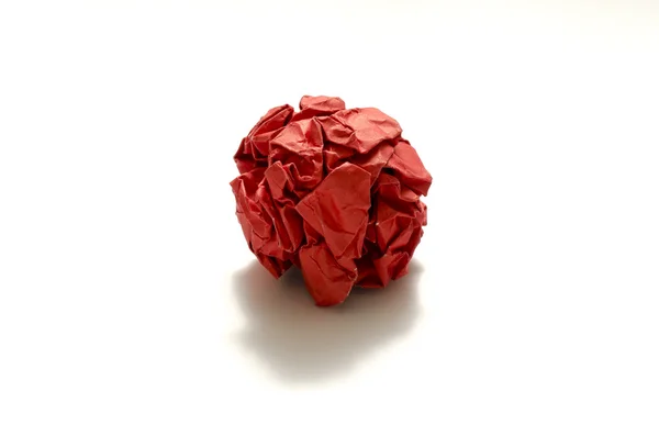 Red crumpled paper ball — Stock Photo, Image