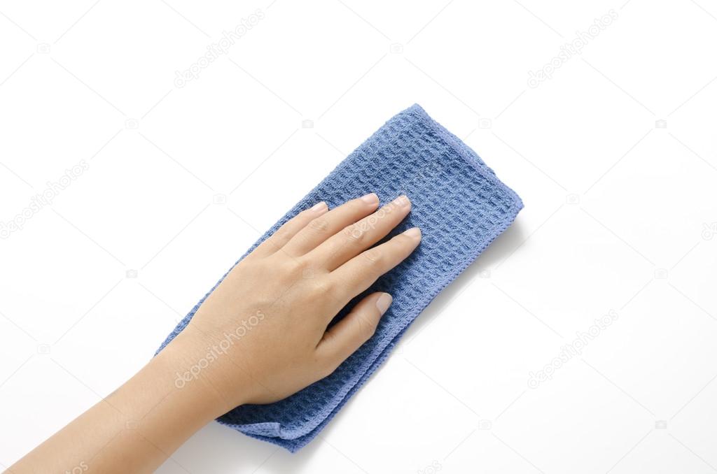 Woman hand with rag