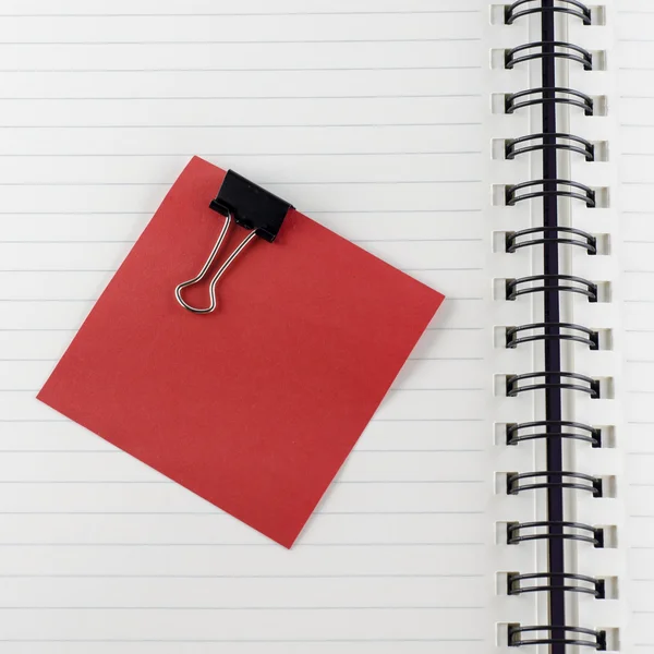 Paper note with clip on notebook — Stock Photo, Image