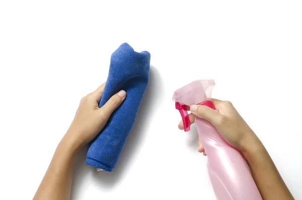 Hand cleaning with spray bottle and blue rag — Stock Photo, Image