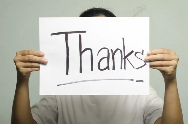 Hand hält Papier Dankeswort schreiben — Stockfoto