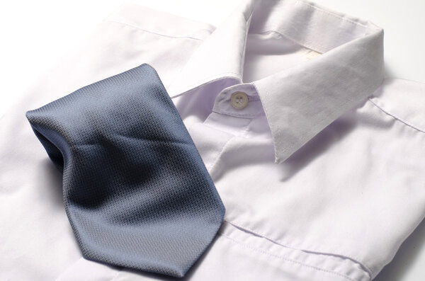 White shirt with blue tie