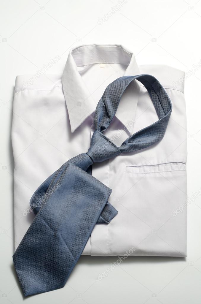 White shirt with blue tie