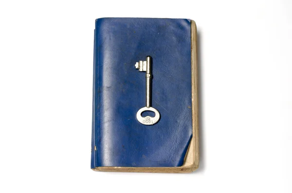 Old book with key — Stock Photo, Image