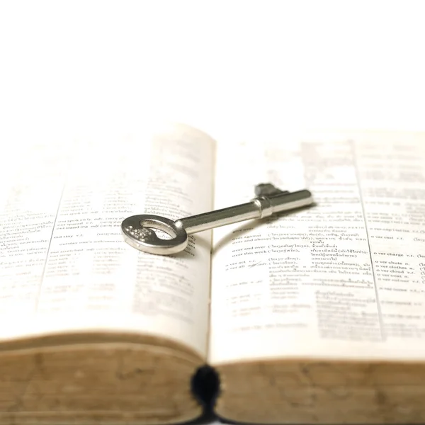 Old book with key — Stock Photo, Image