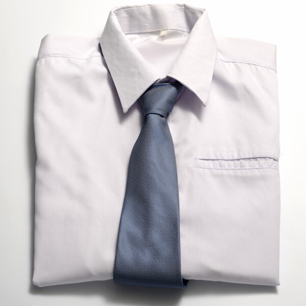 white shirt with blue tie