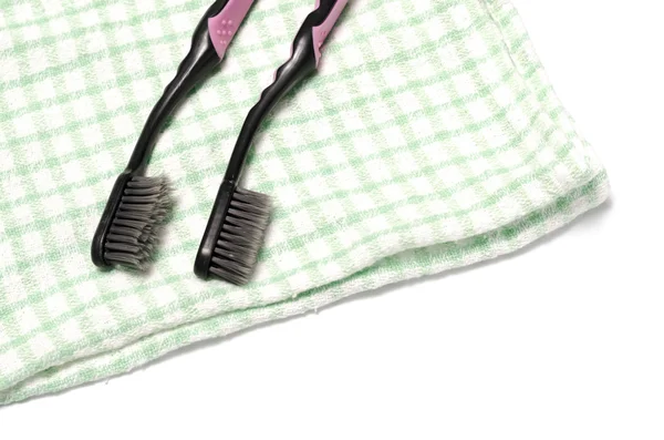 Zubní kartáček a ručník — Stock fotografie
