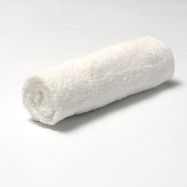 En rulle vit handduk — Stockfoto