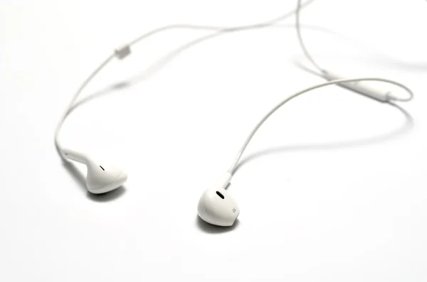 Білі навушники — стокове фото