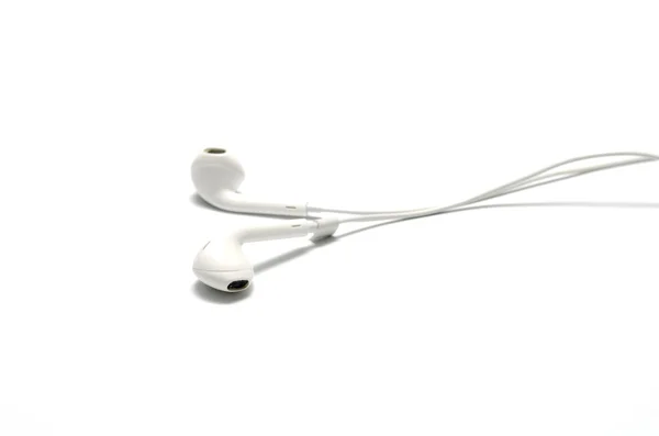 Białe słuchawki — Zdjęcie stockowe