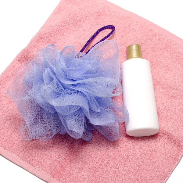 Bath puff liquid soap and towel — Stock Photo, Image