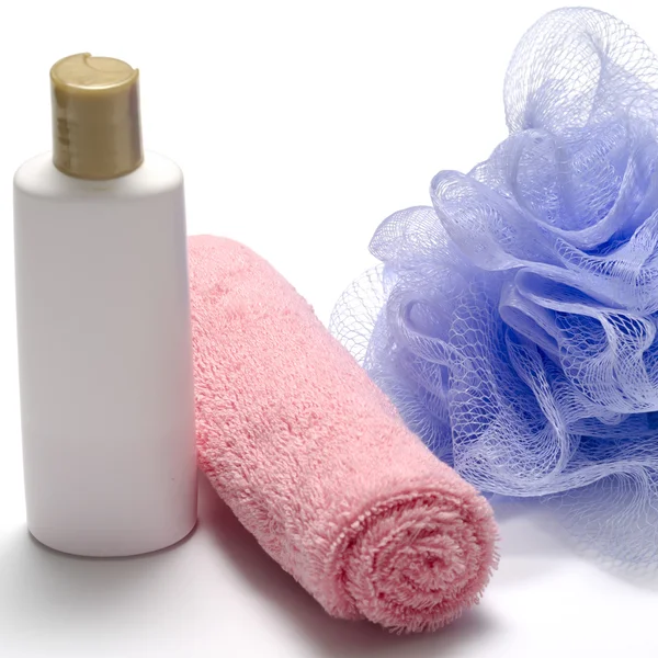 Bath puff liquid soap and towel — Stock Photo, Image