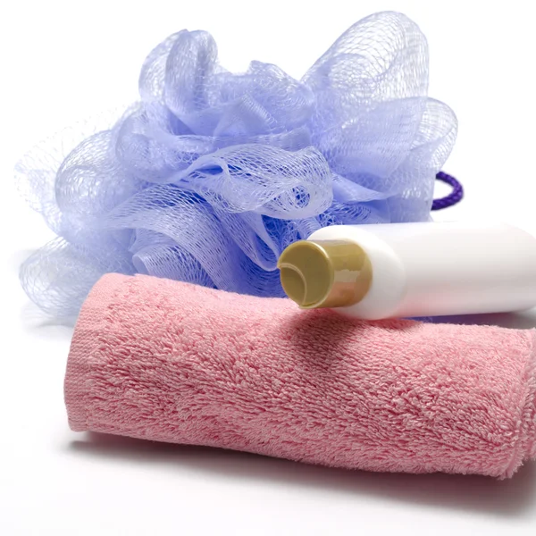 Bath puff liquid soap and towel — Stock Photo, Image